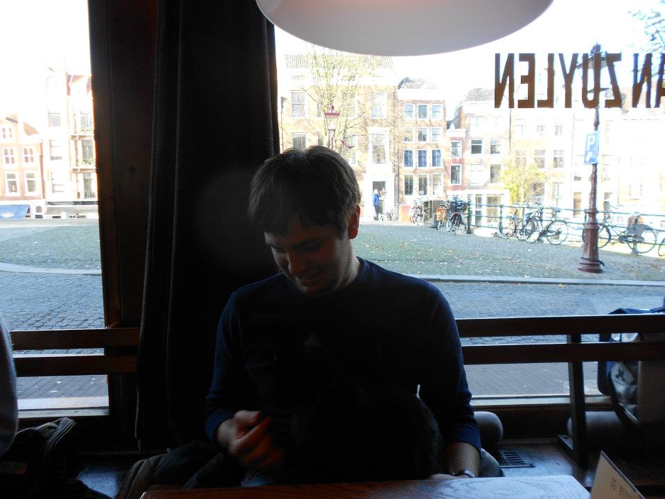 dean sitting in a bar in amsterdam